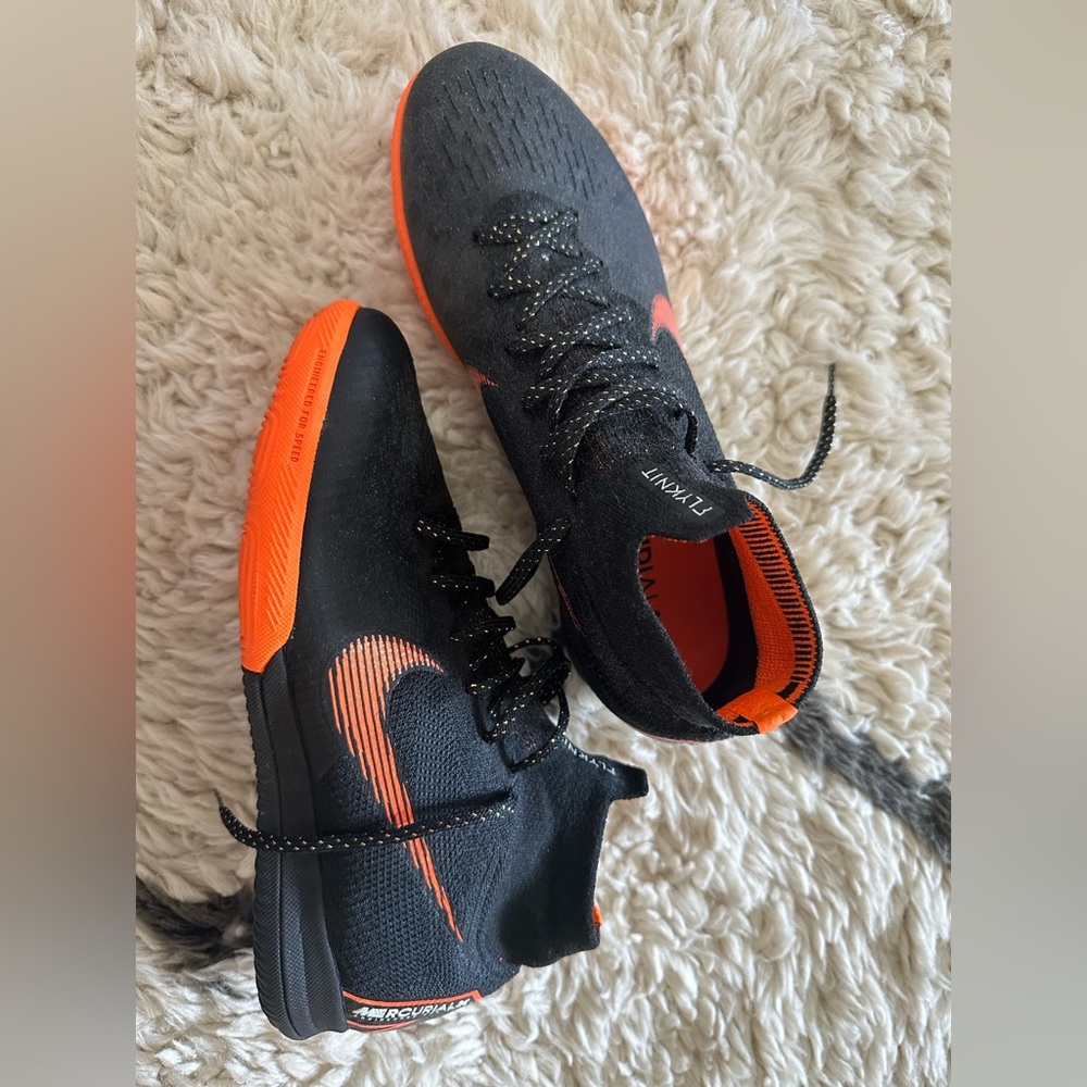 Women’s Nike indoor soccer shoes. Runs a little small, fits like an 8.5 imo.